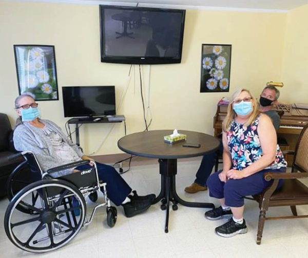 Resident visits family in the visitation room