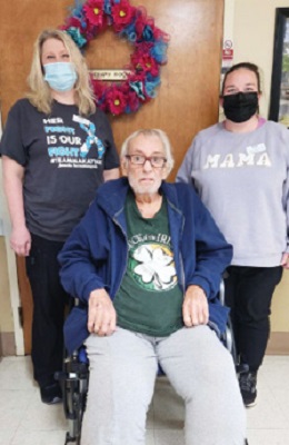 Shady Lawn Resident Tony G. pictured with two female staff members