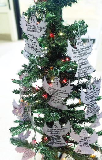 Christmas Tree with paper angels hanging from branches